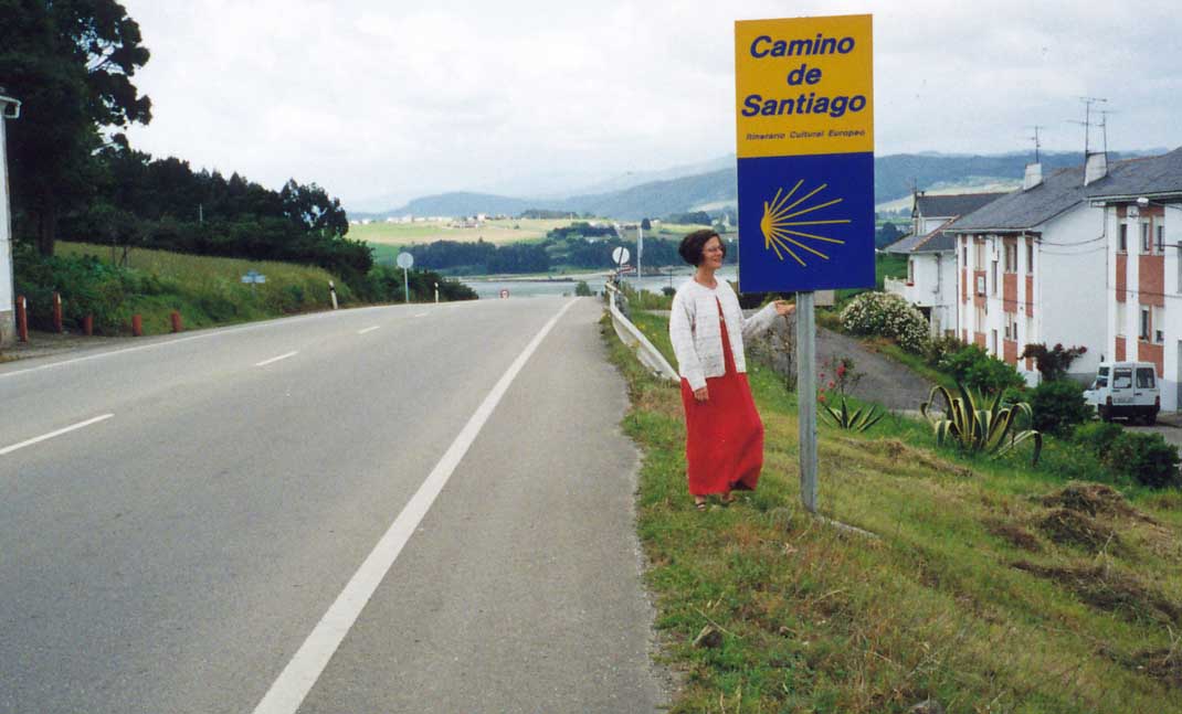 Susan with Road sign - En route to Santiago 1999