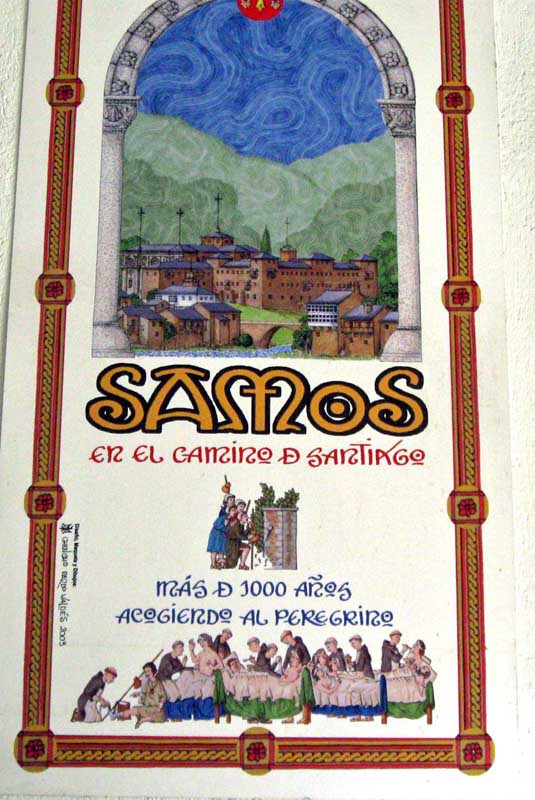 A sign in the hotel dining room.  �Samos in the Camino de Santiago.More than 1000 years of giving refuge to pilgrims.�  Here, monks care for the feet and the sick.